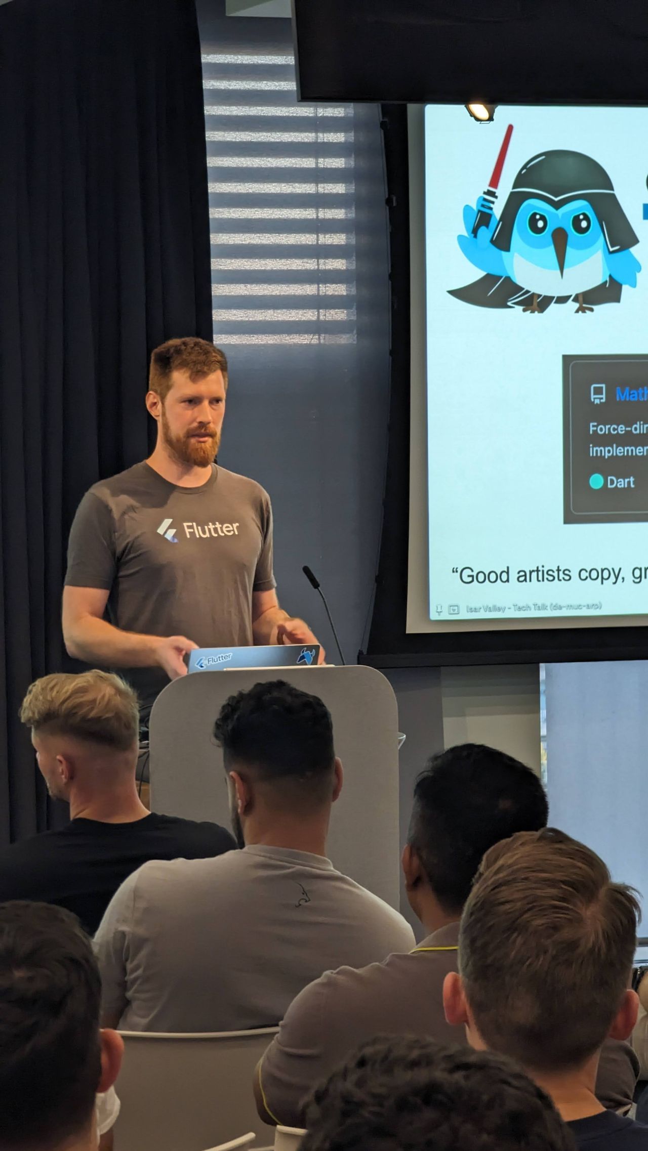 Damian giving a talk